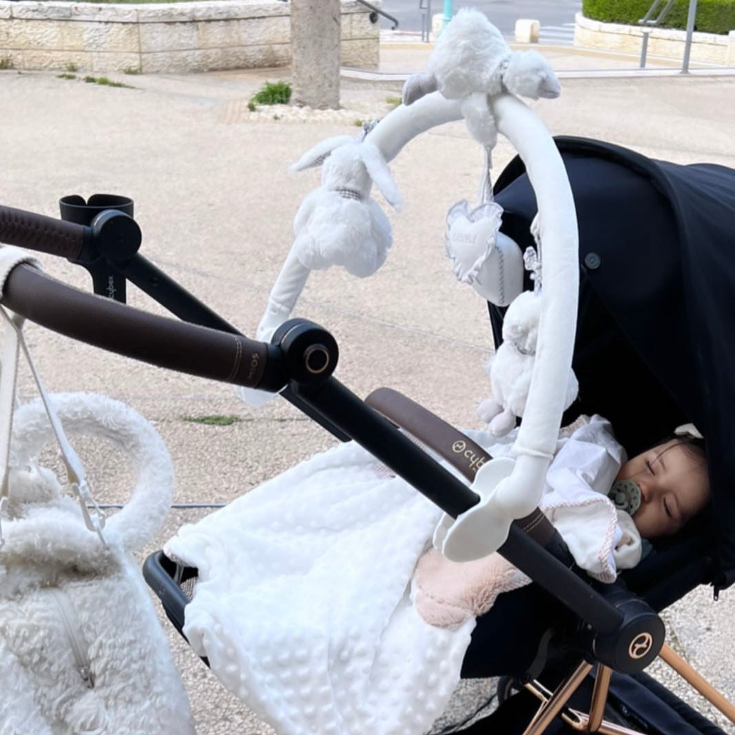 קשת פעילות מתכווננת לעגלה\לעריסה - לבן